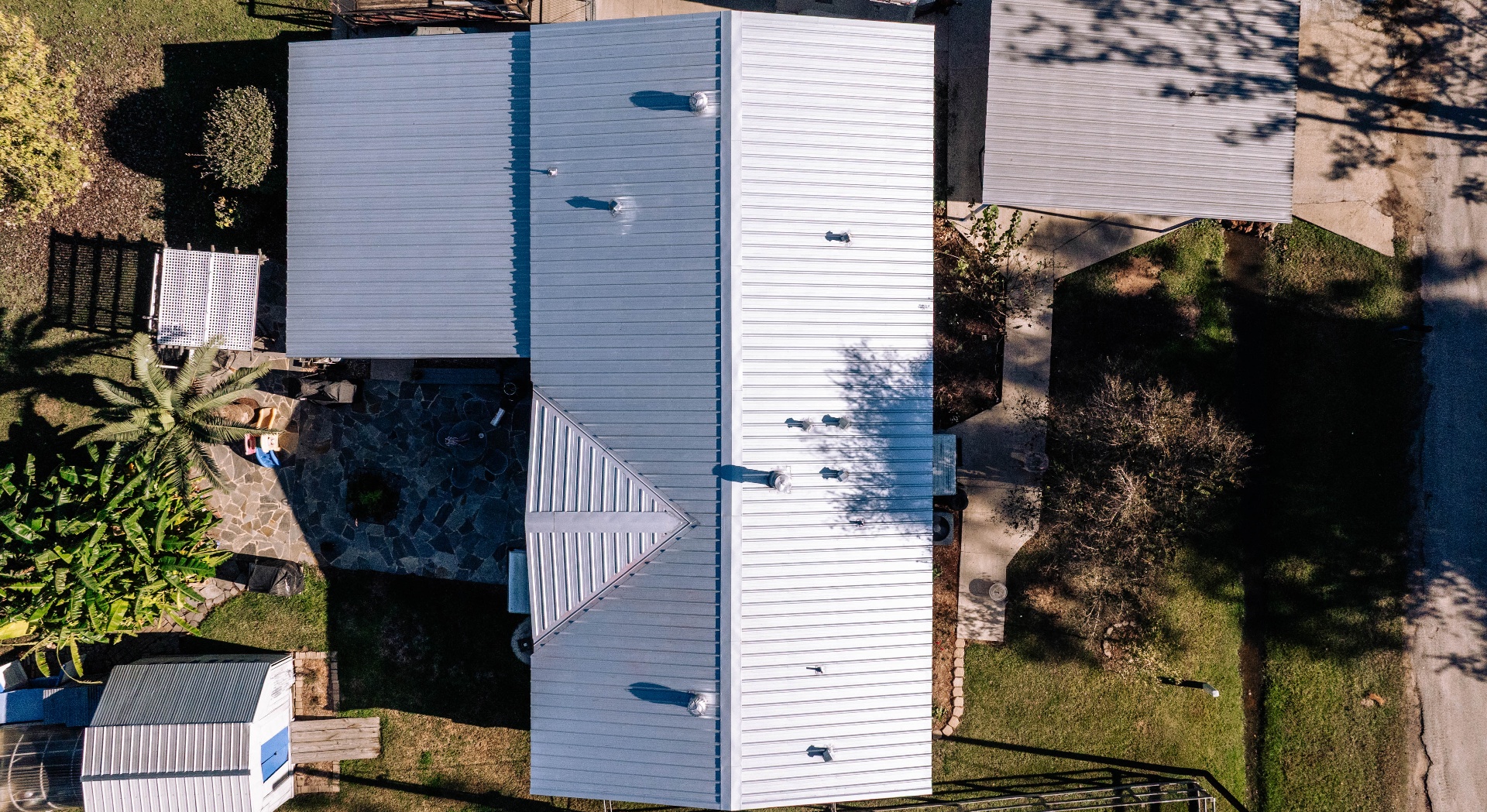 Aerial view of completed standing seam metal roof