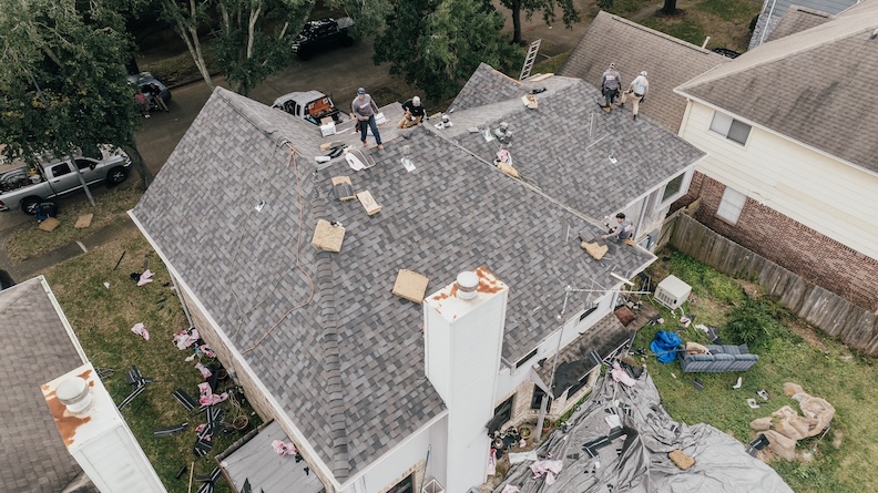 Invictus Exterior crew on a Houston roof