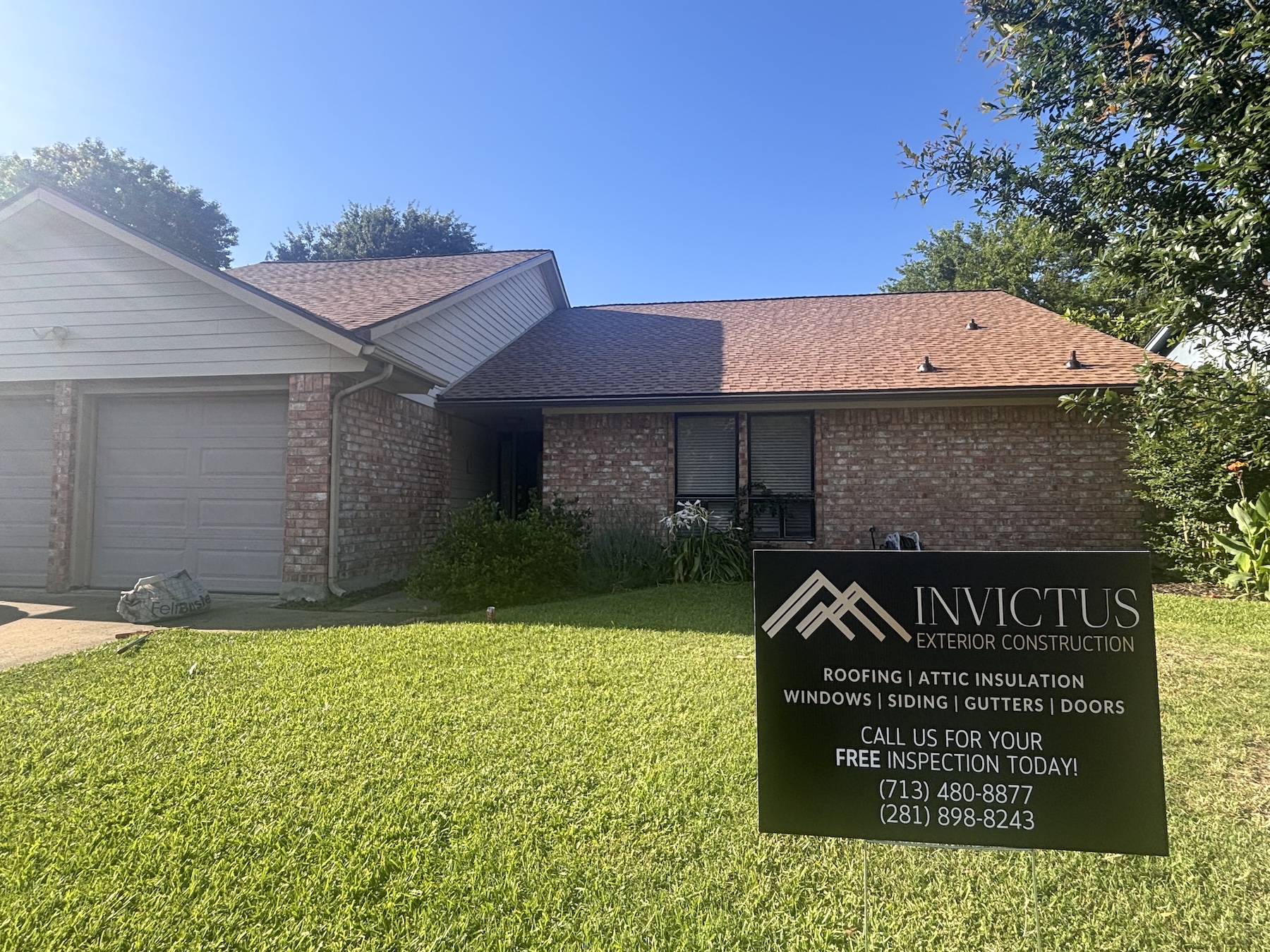 Invictus Exterior crew on a Cypress roof